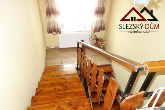 Tel.: 604 799 700 RK Slezský dům