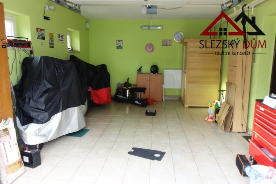Tel.: 604 799 700 RK Slezský dům
