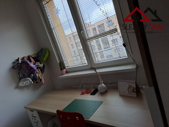 Tel. 604 799 700 RK Slezský dům