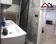 Tel: 604 799 700 RK Slezský dům