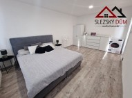 Tel: 604 799 700 RK Slezský dům