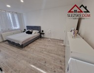 Tel: 604 799 700 RK Slezský dům