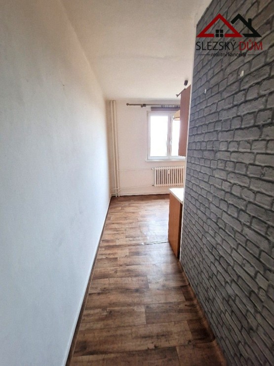 Tel.:604 799 700 RK Slezský dům