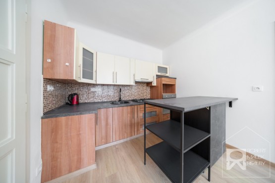 Obývací pokoj s kuchyňským koutem